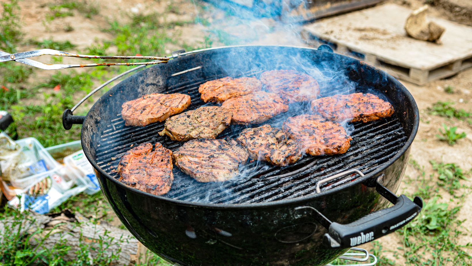 cooking steak tips on grill